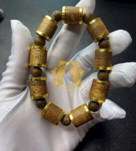 Vòng tay trầm hương tự nhiên việt nam bọc khoen vàng si