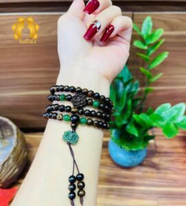 Vòng trầm hương 108 hạt Sánh chìm mix charm sen trầm và sen đá ngọc bích